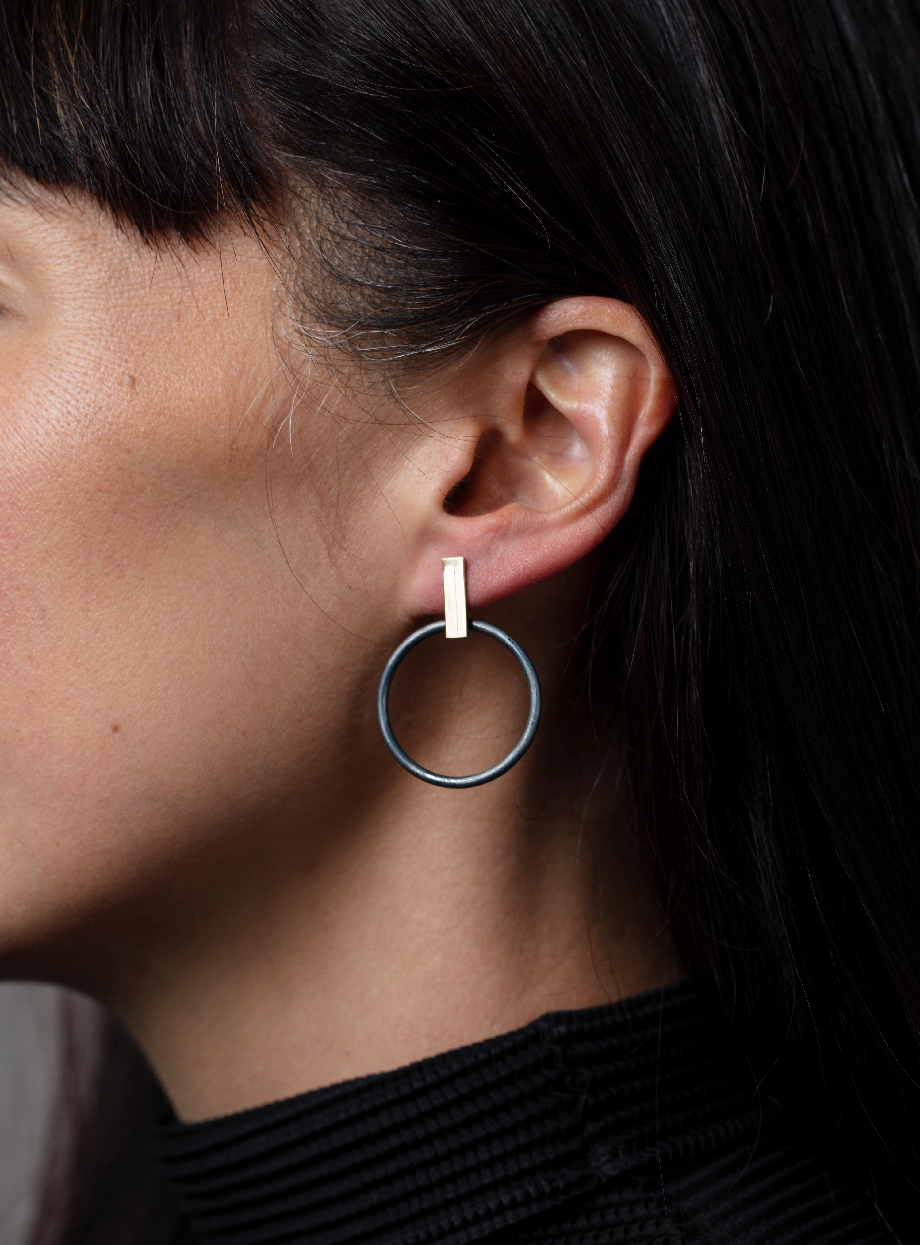 Groundwork #3, 2019. Featuring Rose Megirian, Olympiad Hoops (35x28x2mm), 9kt yellow gold, oxidised sterling silver.