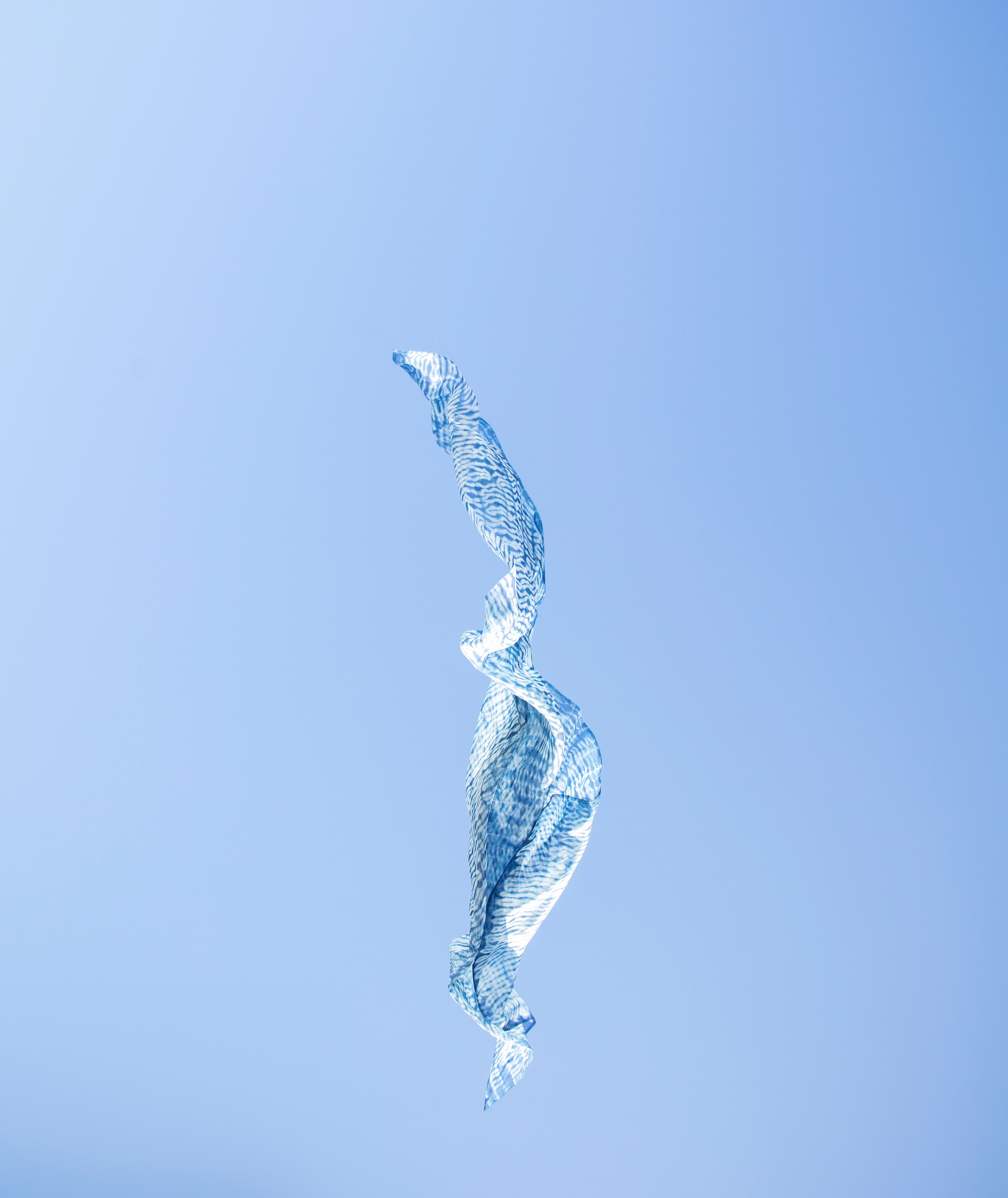 Groundwork #6, 2019. Featuring Kate Weedon-Jones, Shibori Fabric Length (182x1080mm), mokume stitch-resist shibori, indigo dyed silk organza.