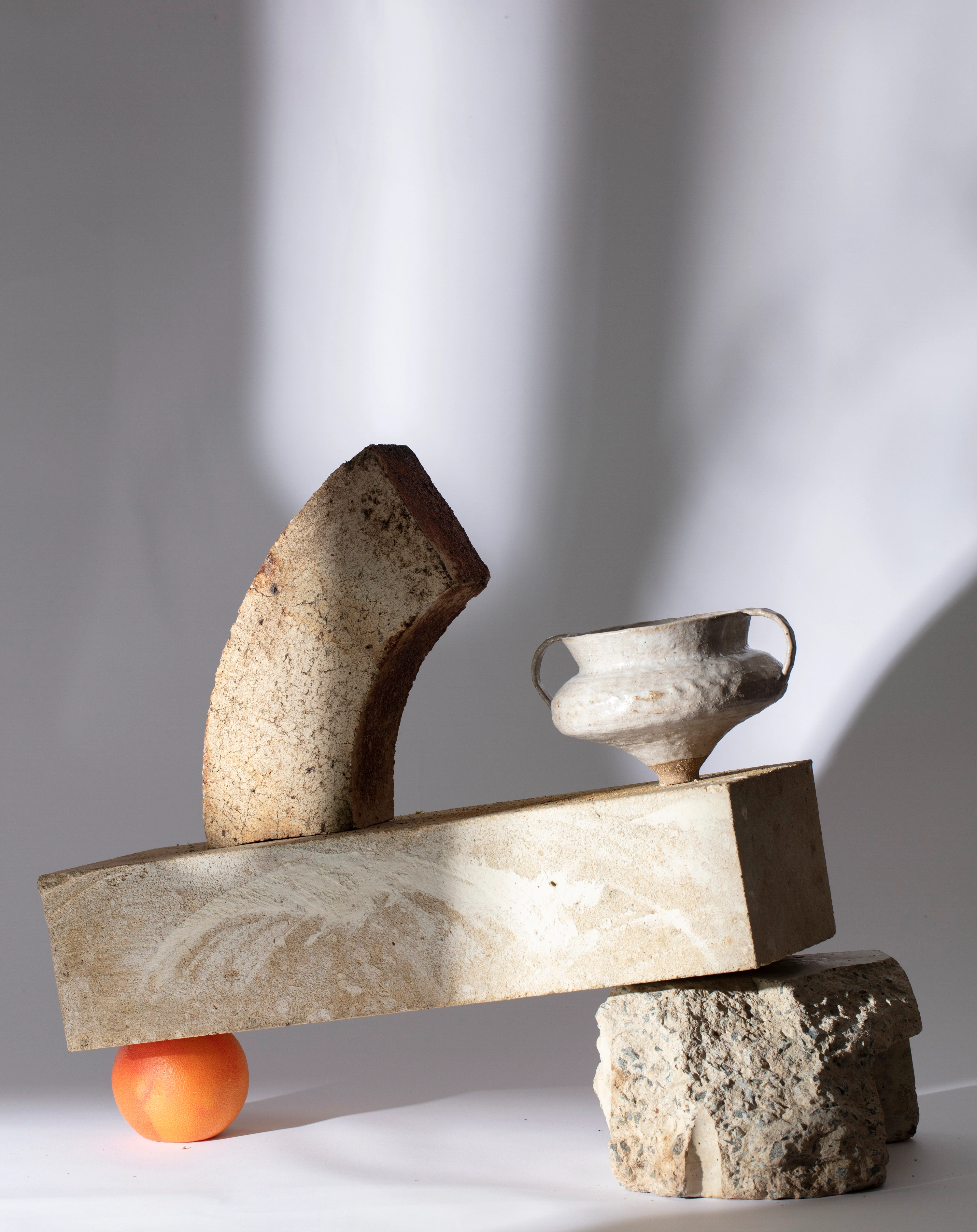 Groundwork #11, 2019. Featuring Joana Partyka, White stoneware vessel (105x190x190mm), glazed dark stoneware.