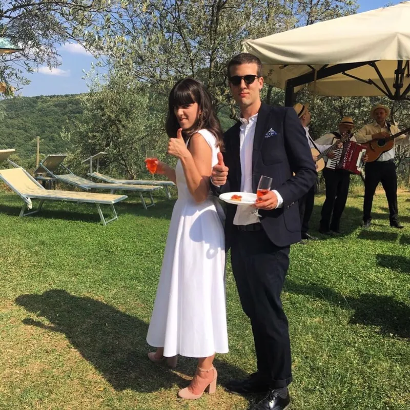 Rachel's custom backless daphne dress in white cotton canvas